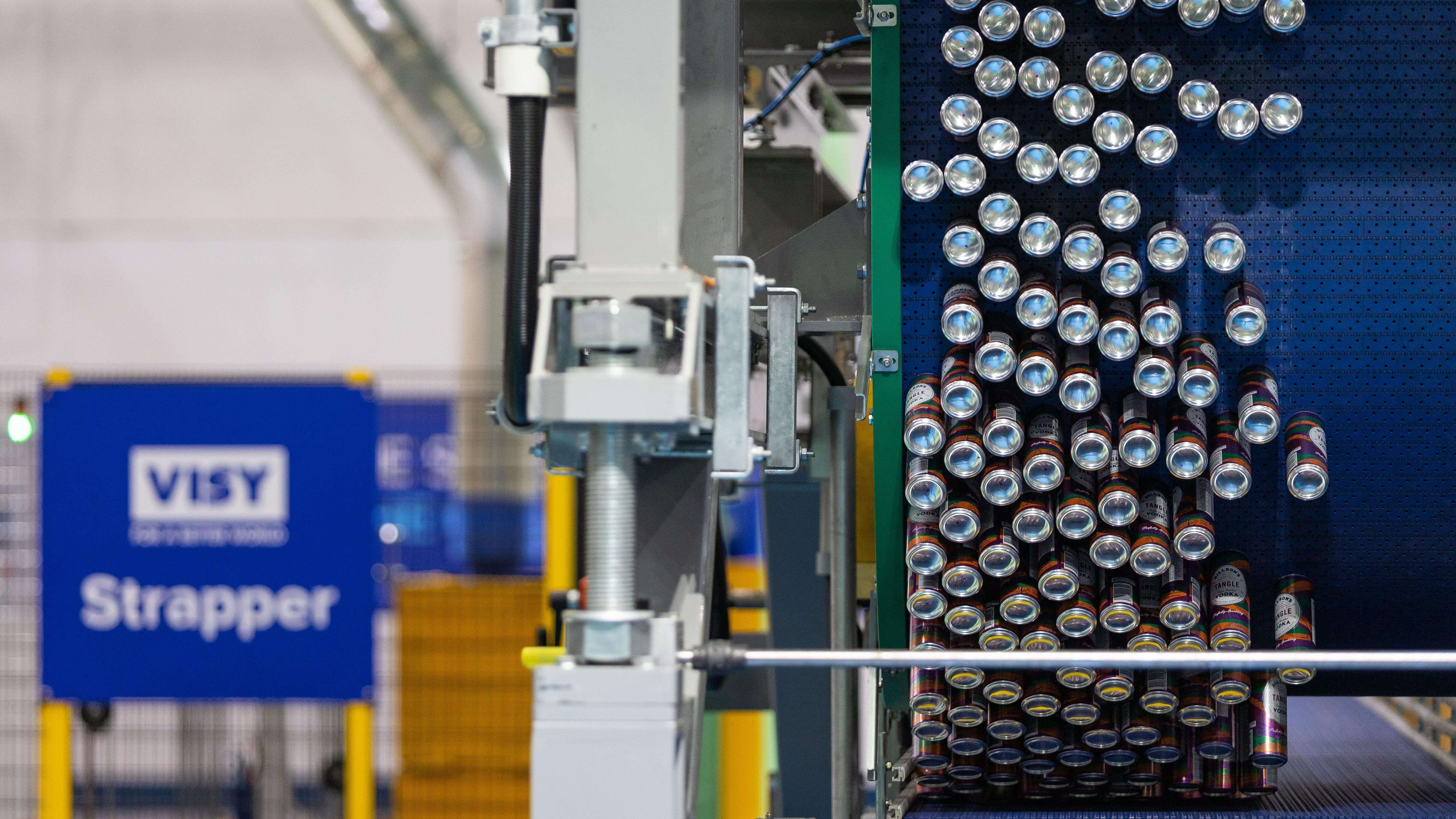 Beverage cans on conveyor belt