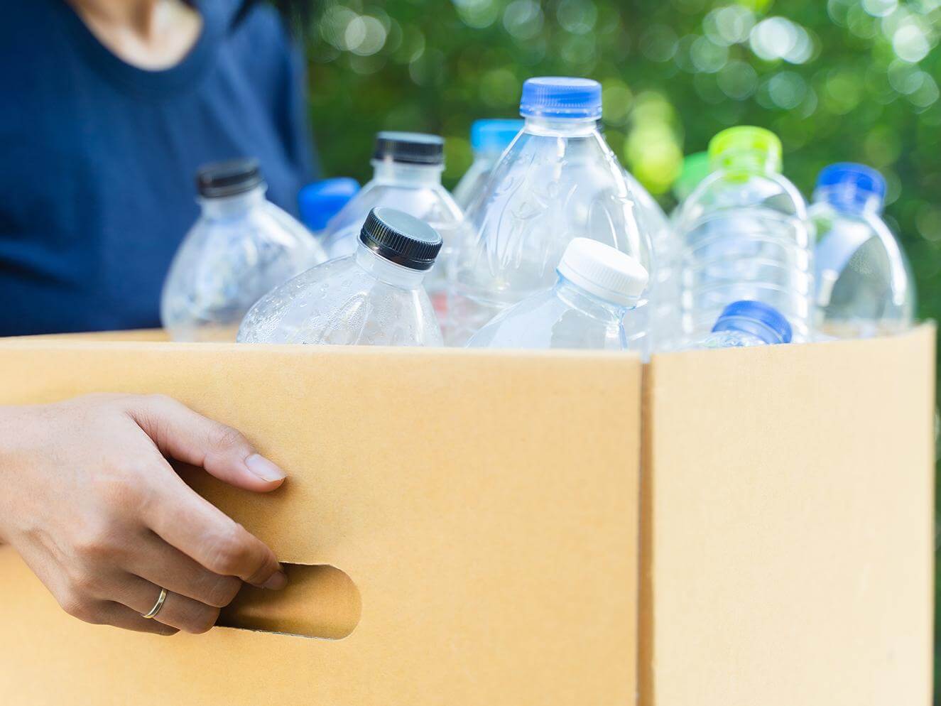 Plastic recycling containers in box